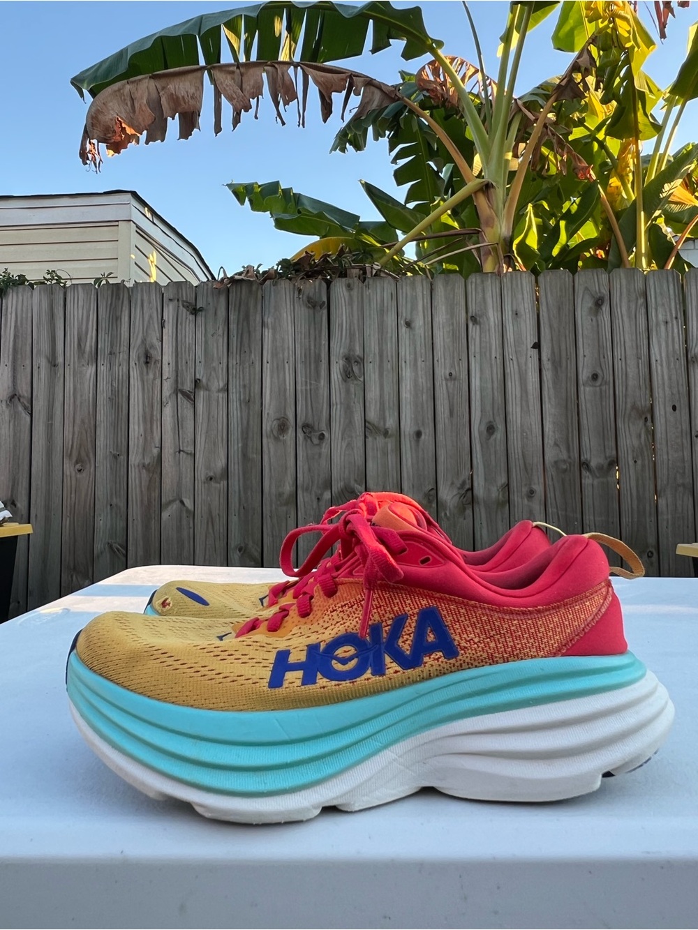 Women’s HOKA Bondi 8 Yellow & Pink Running Shoes with Blue Logo size 6